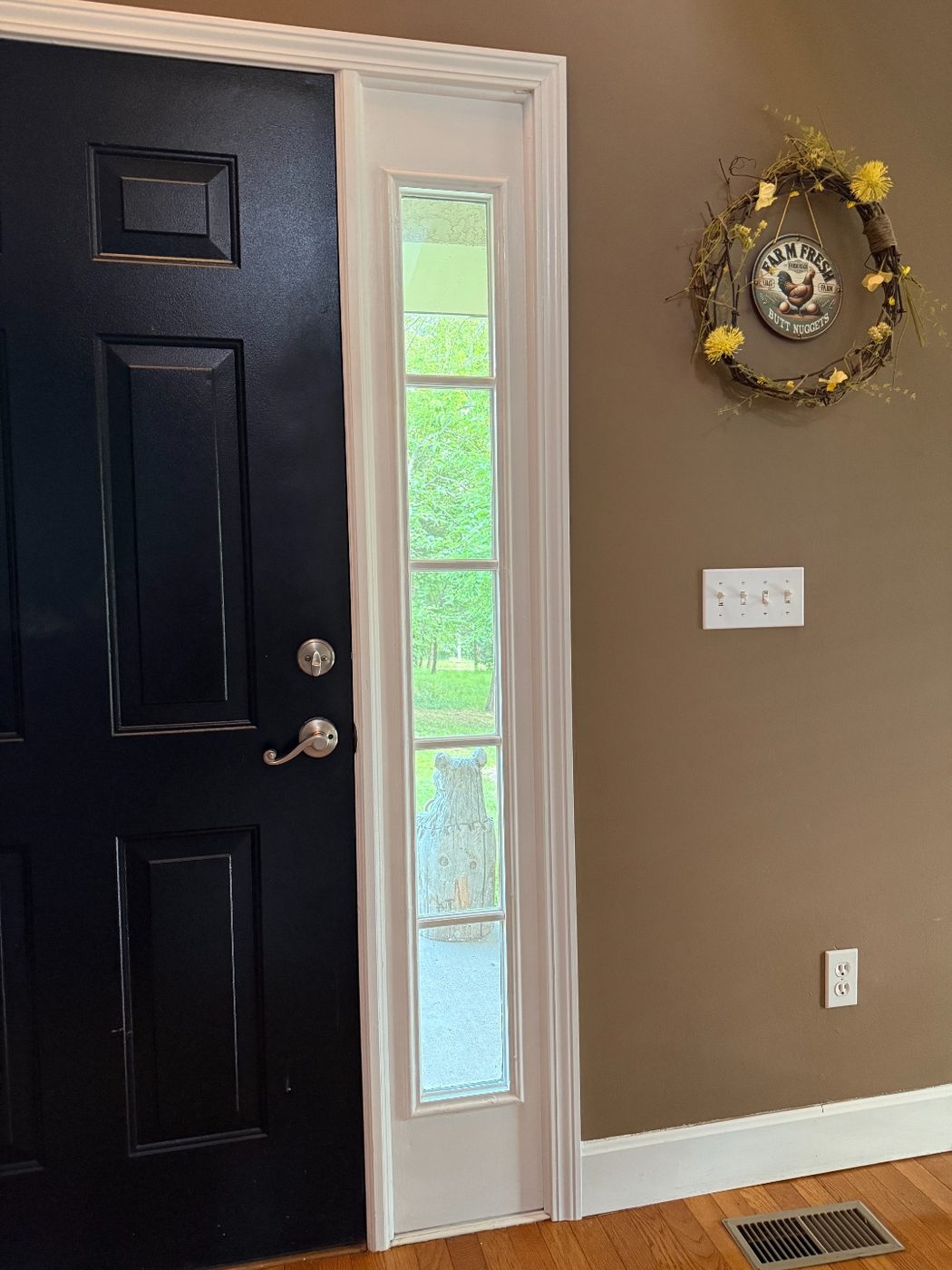 Door sidelight trim repaired and freshly painted white